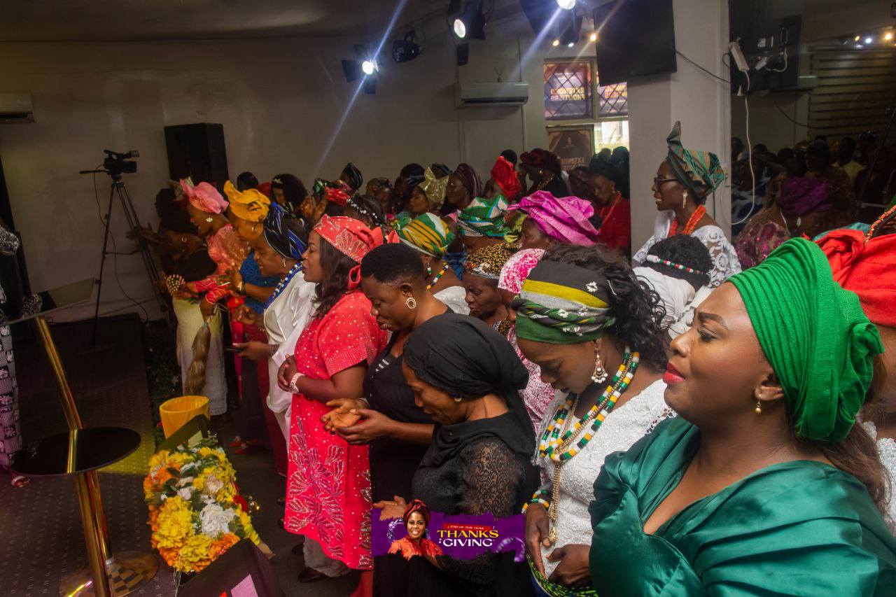 Congregation in colorful traditional attire